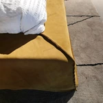 Warm Yellow Suede Upholstered Bed with Minimalist Half-Slat Back Panel & Skirted Base